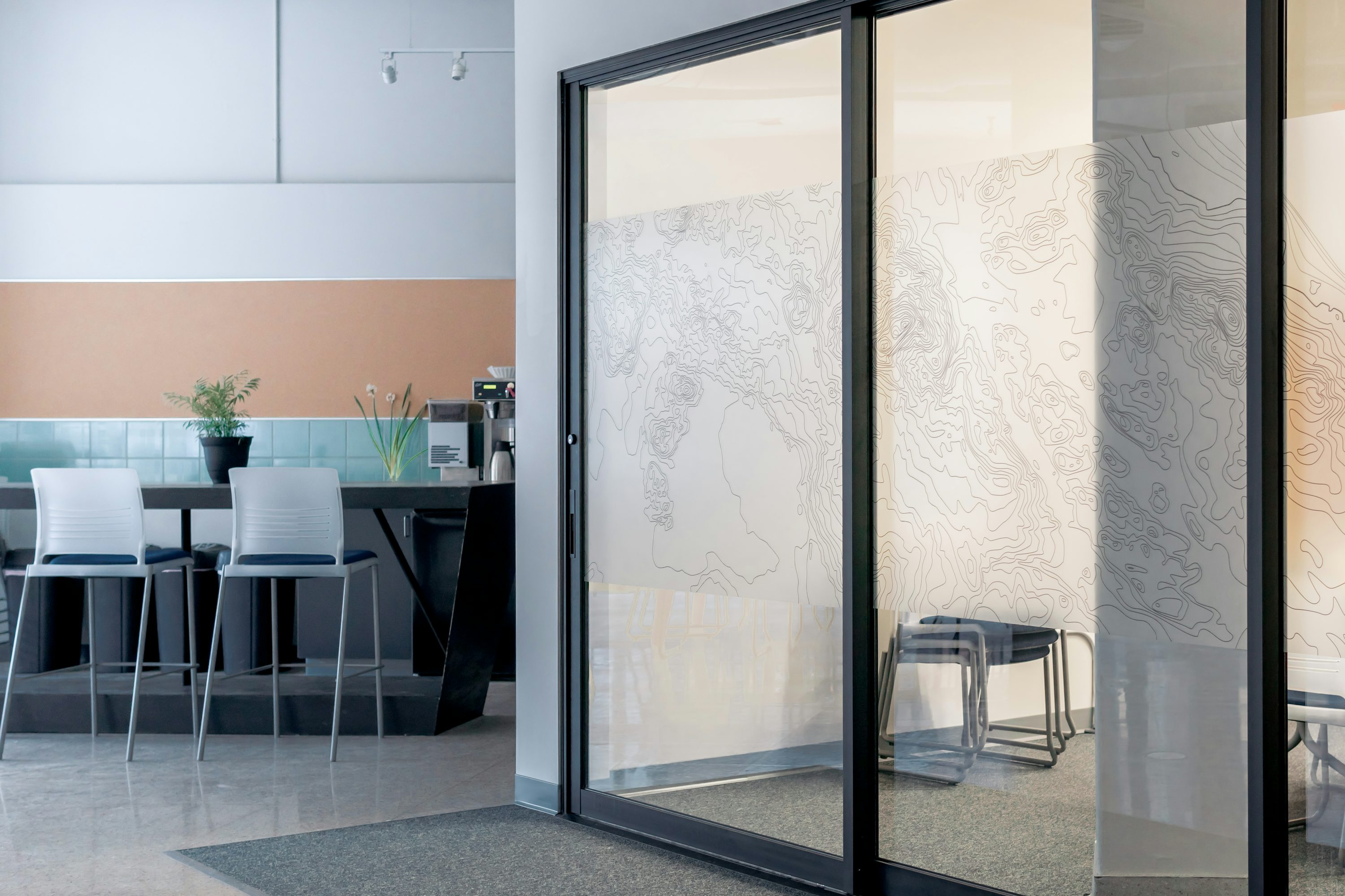 Modern interior sliding door with frosted glass panel